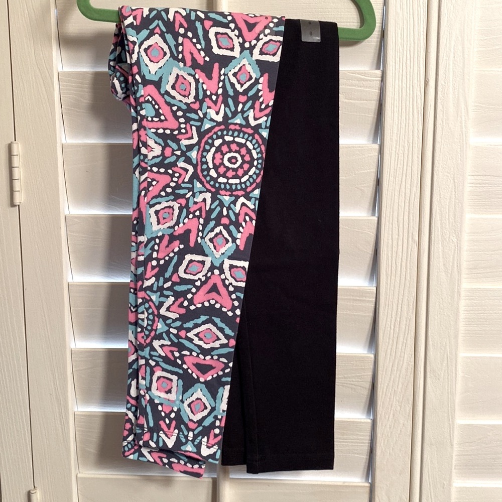 Two pair of girls leggings. Size 8